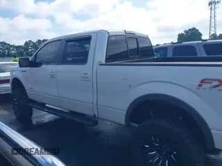 2014 Ford F-150 XL with VIN 1FTFW1ET3EFB42154, listed as a IAAI auction lot 42656209 with 297,149 mi miles and . Bid and sale history available at DreamBid. Image 14.