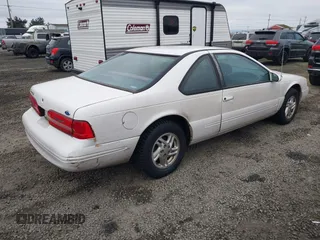 1996 Ford Thunderbird LX with VIN 1FALP6246TH160357, listed as a IAAI auction lot 41442234 with 99,815 mi miles and . Bid and sale history available at DreamBid. Image 4.