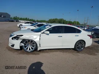 2014 Nissan Altima S with VIN 1N4AL3AP5EN335473, listed as a IAAI auction lot 41952678 with 156,474 mi miles and . Bid and sale history available at DreamBid. Image 15.