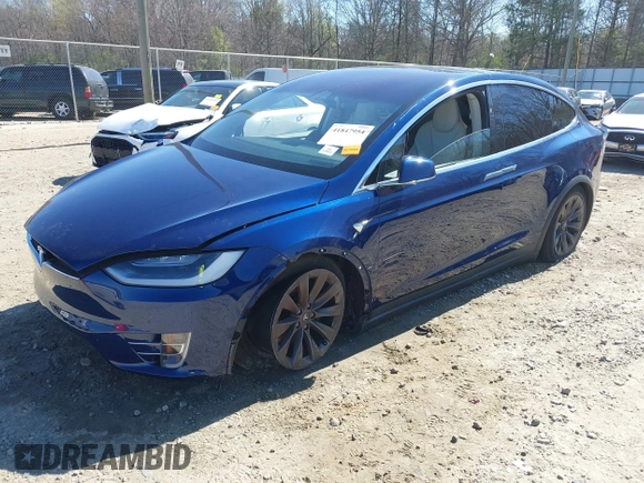 2017 Tesla Model X 90D z VIN 5YJXCBE26HF079022, wystawiony jako IAAI lot #41847954 z przebiegiem 74 940 mil mil oraz . Historia ofert i sprzedaży dostępna na DreamBid. Obrazek 2.