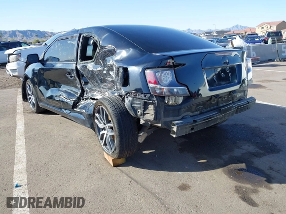 2015 Scion tC with VIN JTKJF5C79FJ003404, listed as a IAAI auction lot 41756024 with 128,906 mi miles. Bid and sale history available at carsss.com. Image 3.