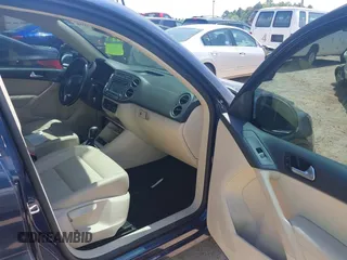 2012 Volkswagen Tiguan SE with VIN WVGAV7AX7CW534703, listed as a IAAI auction lot 42463358 with 119,699 mi miles and . Bid and sale history available at DreamBid. Image 5.