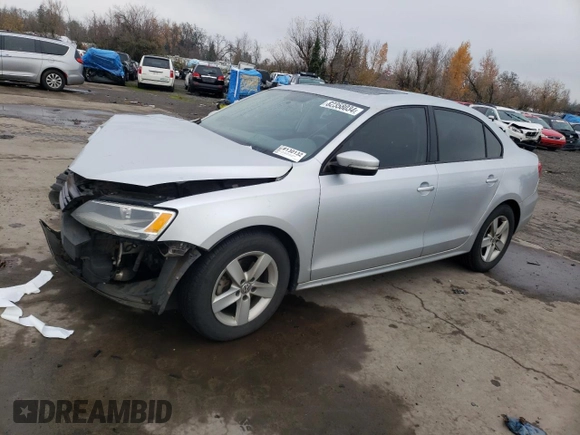 2012 Volkswagen Jetta Sedan TDI with VIN 3VW3L7AJ0CM089765, listed as a Copart auction lot 82358034 with 144,648 mi miles and Salvage Title. Bid and sale history available at carsss.com. Image 1.