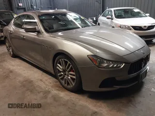 2015 Maserati Ghibli S Q4 z VIN ZAM57RTAXF1146317, wystawiony jako IAAI lot #42154777 z przebiegiem 66 425 mil mil oraz . Historia ofert i sprzedaży dostępna na DreamBid. Obrazek 1.