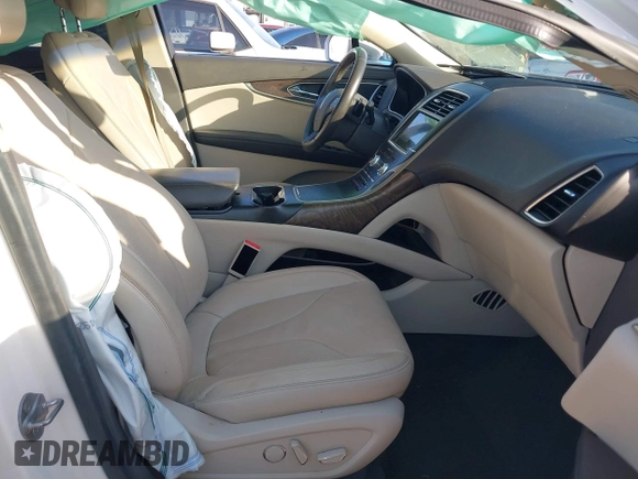 2016 Lincoln MKX Reserve with VIN 2LMTJ6LR4GBL75275, listed as a IAAI auction lot 41936550 with 76,177 mi miles. Bid and sale history available at carsss.com. Image 5.