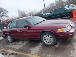2005 Ford Crown Victoria LX with VIN 2FAFP74W25X106106, listed as a IAAI auction lot 41825793 with 175,740 mi miles. Bid and sale history available at carsss.com. Image 13.