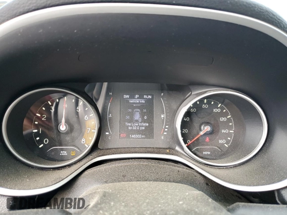 2017 Jeep Compass Sport z VIN 3C4NJCAB3HT652548, wystawiony jako Copart lot #55125455 z przebiegiem 146 302 mil mil oraz Szkoda całkowita • Salvage title. Historia ofert i sprzedaży dostępna na DreamBid. Obrazek 9.