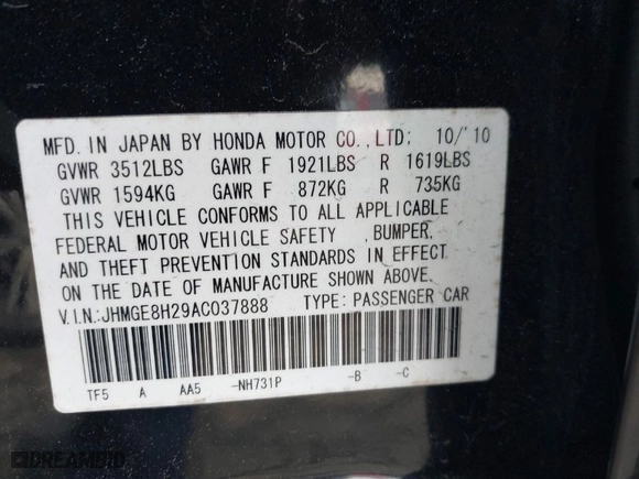 2010 Honda Fit with VIN JHMGE8H29AC037888, listed as a IAAI auction lot 41784180 with 64,855 mi miles. Bid and sale history available at carsss.com. Image 9.