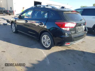 2017 Subaru Impreza Premium with VIN 4S3GTAB63H3721131, listed as a IAAI auction lot 42343352 with 116,939 mi miles and . Bid and sale history available at DreamBid. Image 3.
