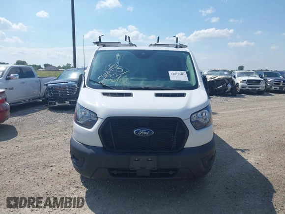 2021 Ford Transit Cargo with VIN 1FTYE1Y80MKA75151, listed as a IAAI auction lot 42577609 with 91,623 mi miles and . Bid and sale history available at DreamBid. Image 12.