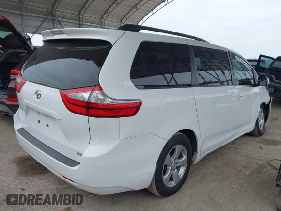 2016 Toyota Sienna LE AAS with VIN 5TDKK3DC3GS706606, listed as a IAAI auction lot 41640543 with 201,316 mi miles. Bid and sale history available at carsss.com. Image 4.