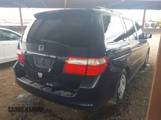 2006 Honda Odyssey EX-L with VIN 5FNRL38666B063025, listed as a IAAI auction lot 41903788 with 145,141 mi miles. Bid and sale history available at carsss.com. Image 4.