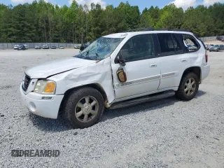 2002 GMC Envoy SLT z VIN 1GKDT13S822323073, wystawiony jako Copart lot #56098895 z przebiegiem Nie podano mil oraz Szkoda całkowita • Salvage title. Historia ofert i sprzedaży dostępna na DreamBid. Obrazek 1.