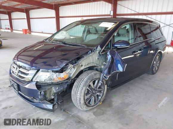 2017 Honda Odyssey Touring with VIN 5FNRL5H90HB017215, listed as a IAAI auction lot 42574528 with 61,386 mi miles and . Bid and sale history available at DreamBid. Image 2.