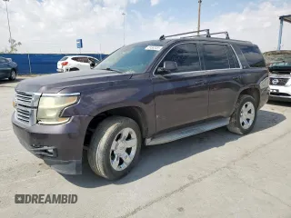 2015 Chevrolet Tahoe LT with VIN 1GNSKBKC8FR130206, listed as a Copart auction lot 59563085 with 66,701 mi miles and Salvage title. Bid and sale history available at DreamBid. Image 1.
