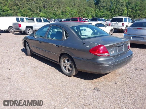 2005 Ford Taurus SE with VIN 1FAFP532X5A272398, listed as a IAAI auction lot 42001798 with 159,199 mi miles. Bid and sale history available at carsss.com. Image 3.
