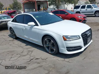 2017 Audi A8 Sport with VIN WAU43AFD3HN010445, listed as a IAAI auction lot 42714864 with 106,748 mi miles and . Bid and sale history available at DreamBid. Image 1.