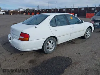 1999 Nissan Altima XE with VIN 1N4DL01D0XC168505, listed as a IAAI auction lot 41928029 with 307,674 mi miles. Bid and sale history available at carsss.com. Image 4.