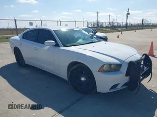 2012 Dodge Charger Police with VIN 2C3CDXAT6CH305817, listed as a IAAI auction lot 41608673 with 173,761 mi miles. Bid and sale history available at carsss.com. Image 1.