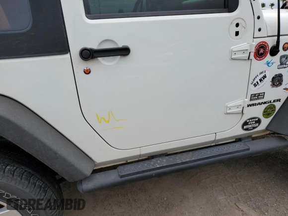 2009 Jeep Wrangler Rubicon with VIN 1J4GA64149L707142, listed as a Copart auction lot 76387344 with Not Provided miles and Salvage Title. Bid and sale history available at DreamBid. Image 12.