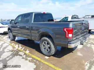 2015 Ford F-150 XLT w/HD Payload Pkg with VIN 1FTFW1EF7FKD04869, listed as a IAAI auction lot 41664736 with 165,784 mi miles. Bid and sale history available at carsss.com. Image 3.