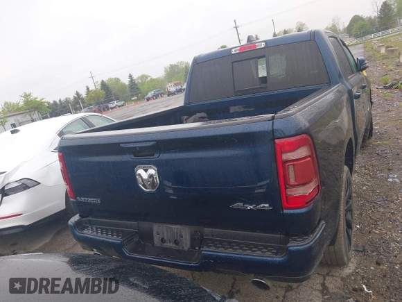 2023 Ram 1500 Laramie with VIN 1C6SRFJT9PN542437, listed as a IAAI auction lot 42256410 with 5 mi miles and . Bid and sale history available at DreamBid. Image 16.