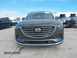2017 Mazda CX-9 Grand Touring with VIN JM3TCADY7H0133092, listed as a IAAI auction lot 41133652 with 233,454 mi miles and . Bid and sale history available at DreamBid. Image 13.