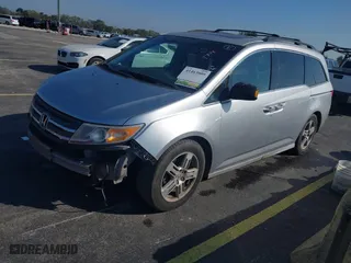 2012 Honda Odyssey Touring with VIN 5FNRL5H90CB066469, listed as a IAAI auction lot 41463009 with NaN miles. Bid and sale history available at carsss.com. Image 18.