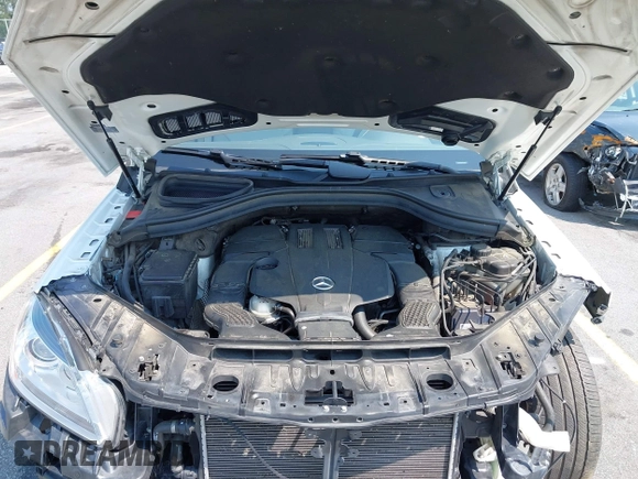 2015 Mercedes-Benz M 400 z VIN 4JGDA5GB3FA462411, wystawiony jako IAAI lot #42388501 z przebiegiem 100 269 mil mil oraz . Historia ofert i sprzedaży dostępna na DreamBid. Obrazek 10.