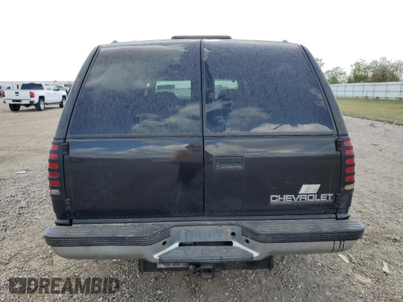 1999 Chevrolet Suburban with VIN 3GNEC16R7XG141671, listed as a Copart auction lot 77784174 with 207,234 mi miles and Salvage Title. Bid and sale history available at carsss.com. Image 6.