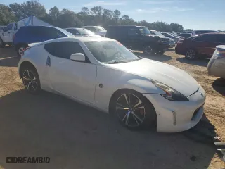 2018 Nissan 370Z Coupe NISMO with VIN JN1AZ4EH5JM572579, listed as a Copart auction lot 82122064 with 125,587 mi miles and Salvage Title. Bid and sale history available at carsss.com. Image 4.