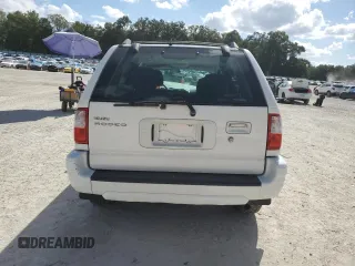 2002 Isuzu Rodeo S with VIN 4S2CK58W124322241, listed as a Copart auction lot 79009994 with 131,793 mi miles and Salvage Title. Bid and sale history available at DreamBid. Image 6.
