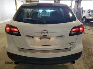2014 Mazda CX-9 Grand Touring z VIN JM3TB3DV9E0428632, wystawiony jako Copart lot #59928885 z przebiegiem 83 697 mil mil oraz Szkoda całkowita • Salvage title. Historia ofert i sprzedaży dostępna na DreamBid. Obrazek 6.