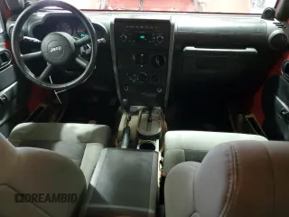 2008 Jeep Wrangler Unlimited X with VIN 1J8GA39128L645762, listed as a Copart auction lot 57888345 with 205,178 mi miles and Salvage title. Bid and sale history available at DreamBid. Image 8.