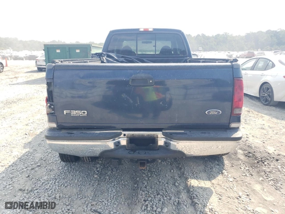 2001 Ford Super Duty F-350 DRW XL with VIN 1FTWW33FX1EB91067, listed as a Copart auction lot 68024904 with 272,132 mi miles and Salvage Title. Bid and sale history available at carsss.com. Image 6.