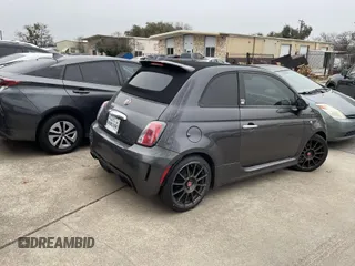 2014 FIAT 500 Abarth with VIN 3C3CFFJH8ET190132, listed as a IAAI auction lot 41574469 with 105,809 mi miles. Bid and sale history available at carsss.com. Image 4.