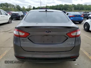 2013 Ford Fusion Titanium Hybrid with VIN 3FA6P0RU9DR309263, listed as a Copart auction lot 72704284 with 157,035 mi miles and Non Repairable. Bid and sale history available at carsss.com. Image 7.