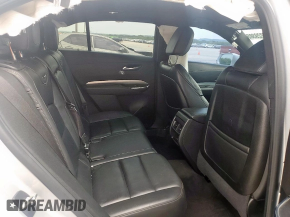 2021 Cadillac XT4 FWD Premium Luxury z VIN 1GYFZCR42MF004233, wystawiony jako Copart lot #57229385 z przebiegiem 98 387 mil mil oraz Szkody całkowita. Historia ofert i sprzedaży dostępna na DreamBid. Obrazek 11.