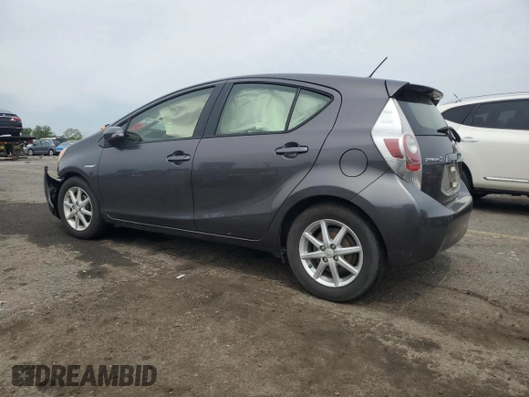 2014 Toyota Prius One z VIN JTDKDTB33E1066355, wystawiony jako Copart lot #58524285 z przebiegiem Nie podano mil oraz Szkoda całkowita • Salvage title. Historia ofert i sprzedaży dostępna na DreamBid. Obrazek 2.
