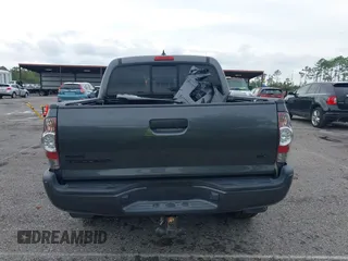 2014 Toyota Tacoma with VIN 5TFLU4EN9EX099414, listed as a IAAI auction lot 40528514 with 122,827 mi miles. Bid and sale history available at carsss.com. Image 15.