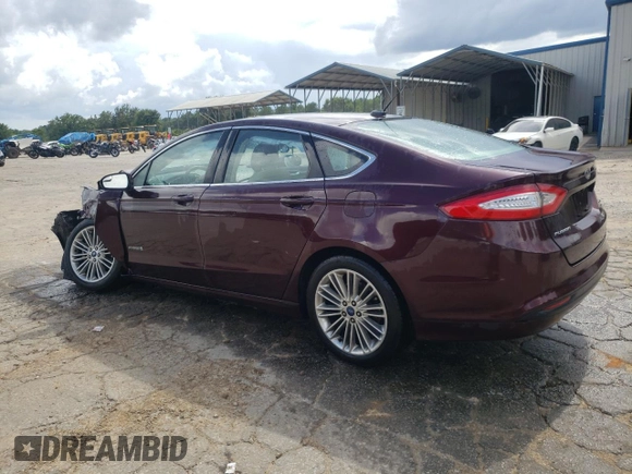 2013 Ford Fusion SE Hybrid z VIN 3FA6P0LU7DR197801, wystawiony jako Copart lot #60468095 z przebiegiem 169 215 mil mil oraz Szkoda całkowita • Salvage title. Historia ofert i sprzedaży dostępna na DreamBid. Obrazek 2.