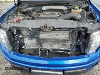 2014 Ford F-150 XL with VIN 1FTFX1EF9EKF67215, listed as a Copart auction lot 51594605 with 184,079 mi miles and Salvage Title. Bid and sale history available at carsss.com. Image 11.