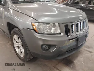 2013 Jeep Compass Sport with VIN 1C4NJDBBXDD225517, listed as a IAAI auction lot 41271099 with 168,204 mi miles. Bid and sale history available at carsss.com. Image 6.