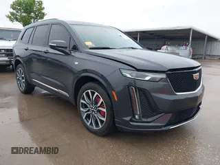 2023 Cadillac XT6 AWD Sport with VIN 1GYKPGRS0PZ177620, listed as a IAAI auction lot 42432423 with 24,070 mi miles and . Bid and sale history available at DreamBid. Image 1.