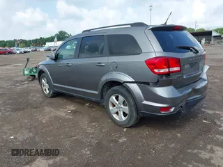 2012 Dodge Journey SXT with VIN 3C4PDDBG2CT146220, listed as a IAAI auction lot 42661371 with 103,378 mi miles and . Bid and sale history available at DreamBid. Image 3.