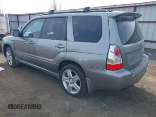 2007 Subaru Forester Sports XT with VIN JF1SG69637H729903, listed as a IAAI auction lot 41841683 with 189,021 mi miles. Bid and sale history available at carsss.com. Image 3.