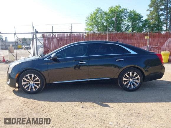 2013 Cadillac XTS Premium z VIN 2G61S5S34D9127996, wystawiony jako IAAI lot #41978539 z przebiegiem 185 157 mil mil oraz . Historia ofert i sprzedaży dostępna na DreamBid. Obrazek 14.