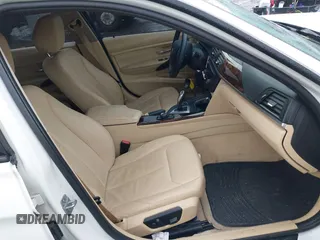 2013 BMW 3 Series 328i xDrive with VIN WBA3B3G50DNR81124, listed as a IAAI auction lot 41087933 with 133,660 mi miles and . Bid and sale history available at DreamBid. Image 5.