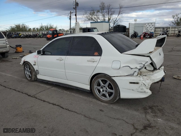 2005 Mitsubishi Lancer Evolution VIII with VIN JA3AH86D45U028033, listed as a Copart auction lot 74323774 with 204,046 mi miles and Salvage Title. Bid and sale history available at carsss.com. Image 2.