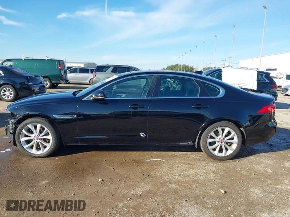 2019 Jaguar XF 25t Premium with VIN SAJBJ4FX5KCY78947, listed as a IAAI auction lot 41261473 with 68,891 mi miles. Bid and sale history available at carsss.com. Image 15.